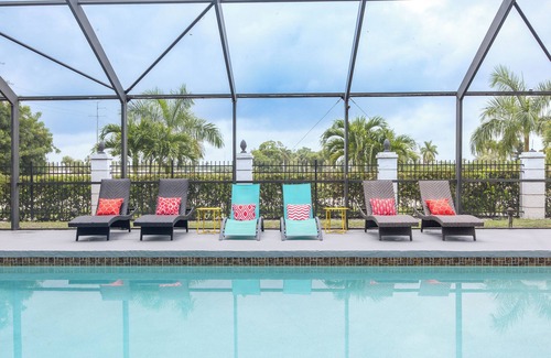 Cypress Lake House | Inviting Palm Palace: Spacious Home with Pool Near Beaches