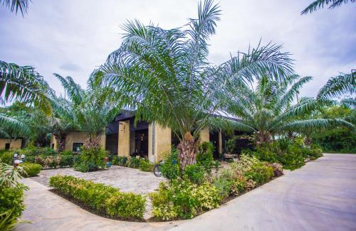 Pranburi Resort | Discover Palm Pran Resort: Family-Friendly with Pool Access