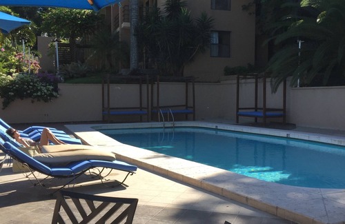 Petionville Apartment | Relax at Palm Residence: Family-Friendly with Pool Access