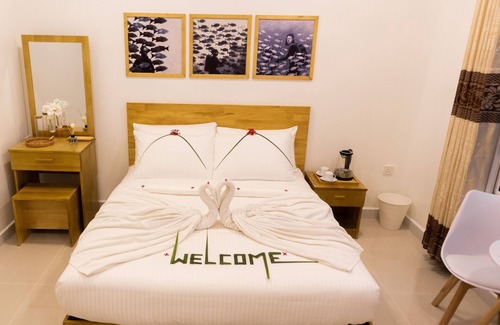 Magoodhoo House | Discover Palm Rest Maldives: Family-Friendly Accommodations