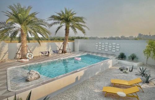 Pak Nam Pran House | Oceanfront Palm Springs Villa Pranburi with Pool & Views