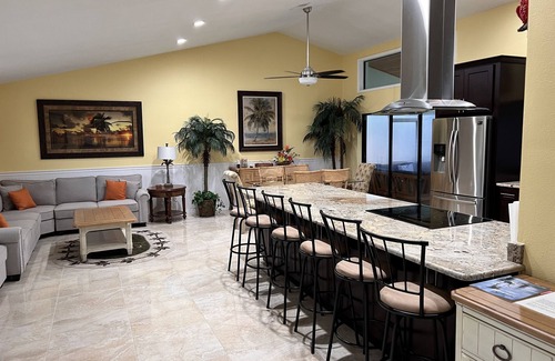 Apollo Beach House | Inviting Palm Tree III Pool Home with Ocean View & Spa