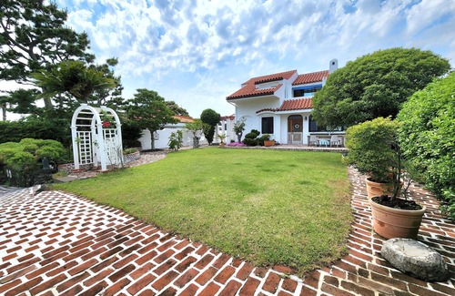 Seogwipo City House | Relaxing Ocean View at Palm Tree Hill Villa Retreat