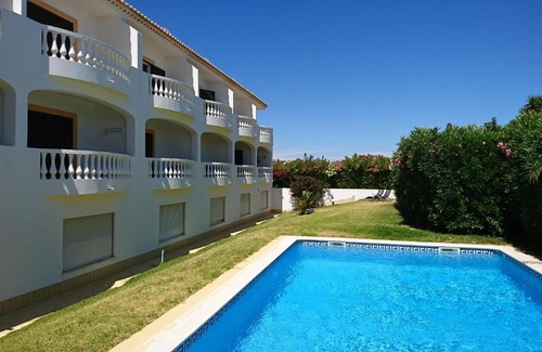 Luz Apartment | Experience Bliss at Palm Trees with Ocean Views & Pool