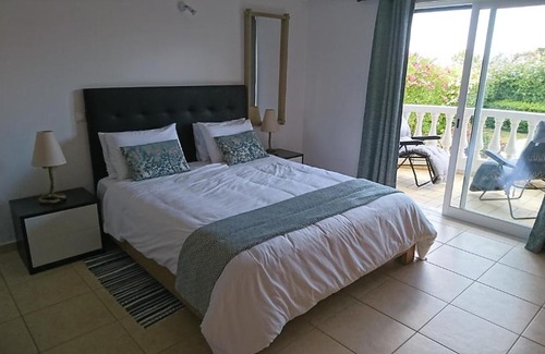 Luz Apartment | Experience Bliss at Palm Trees with Ocean Views & Pool