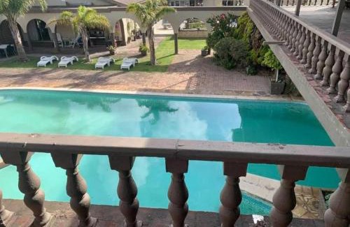 Nelson Mandela Bay House | Relax at Palm Villa: Highly Rated with Kitchen Amenities