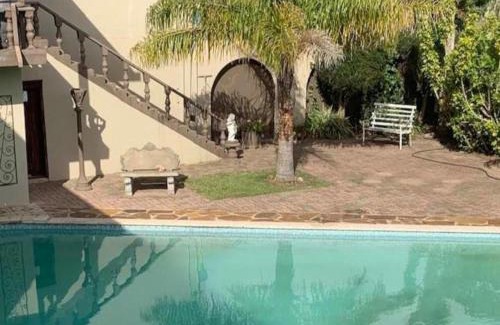 Nelson Mandela Bay House | Relax at Palm Villa: Highly Rated with Kitchen Amenities