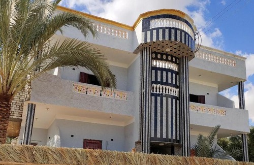 Siwa Apartment | Family-Friendly Palma Garden: Pet and Kid Approved Stays