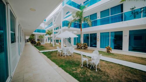 Covenas Hotel | Discover Hotel Palma Linda: Oceanfront Retreat with Pool
