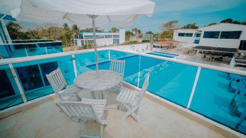 Covenas Hotel | Discover Hotel Palma Linda: Oceanfront Retreat with Pool