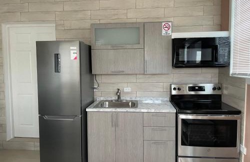 Humacao Apartment | Palmas View Premium 5: Family-Friendly Getaway with Hot Tub