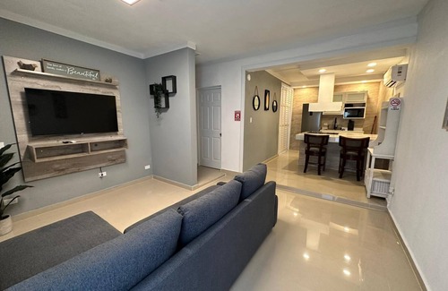 Humacao Pueblo Apartment | Elegant Palmas View Premium 7: Top-Rated Poolside Retreat