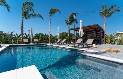 Petaloudes Apartment | Elegant Palmeral Suites with Ocean Views & Hot Tub Access