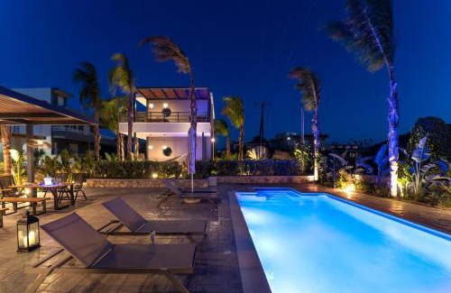 Petaloudes Apartment | Elegant Palmeral Suites with Ocean Views & Hot Tub Access