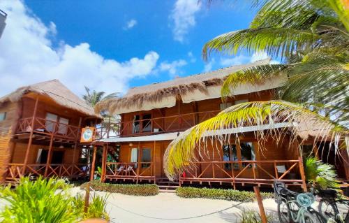 Mahahual Cabin | Family-Friendly Palmeras de Mahahual Cabañas Await You