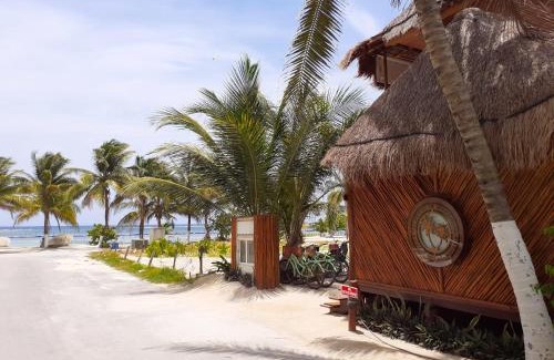 Mahahual Cabin | Family-Friendly Palmeras de Mahahual Cabañas Await You