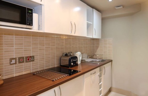 West End Apartment | Palmerston Suites: Family-Friendly Retreat with Spa Amenities
