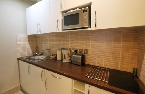 West End Apartment | Palmerston Suites: Family-Friendly Retreat with Spa Amenities