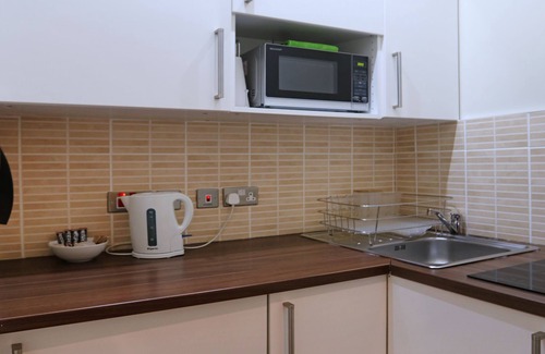 West End Apartment | Palmerston Suites: Family-Friendly Retreat with Spa Amenities