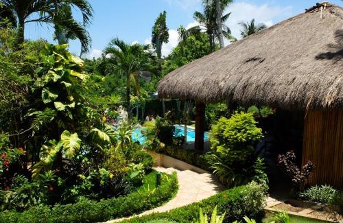 Manoc-Manoc Villa | Experience Palmhill Villa: Eco-Friendly Oceanfront Retreat