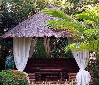 Manoc-Manoc Villa | Experience Palmhill Villa: Eco-Friendly Oceanfront Retreat