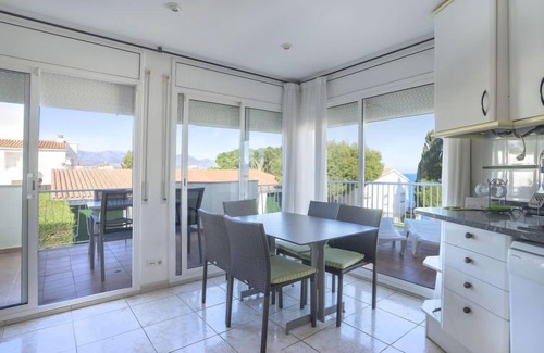 Llanca Apartment | Oceanfront Retreat: Palmiers I by Interhome - 9.2/10 Rated