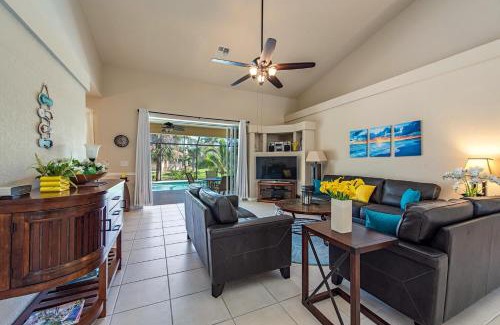 Palm River Estates Villa | Relaxing Palms and Pool Home Near Naples Best Beaches