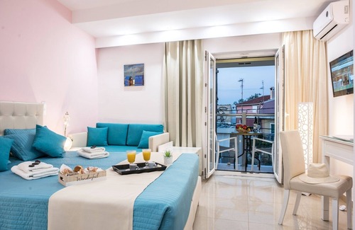 Gouvia Hotel | Gouvia's Palotel Design: Family-Friendly Retreat with Pool