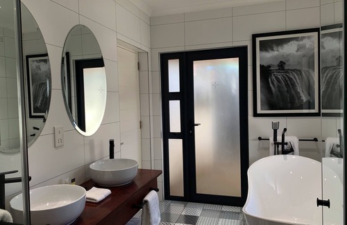 Victoria Falls Cabin | Experience Pamarah Lodge: 4-Star Stay with Pool & Breakfast