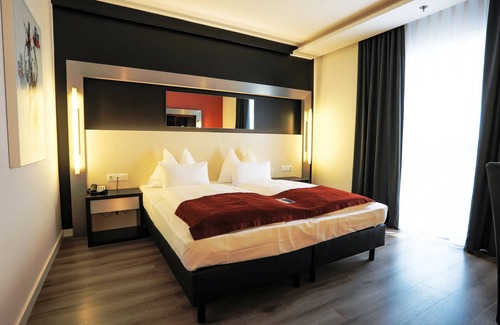 Parndorf Hotel | Experience Pannonia Tower Parndorf: 4-Star Comfort Awaits