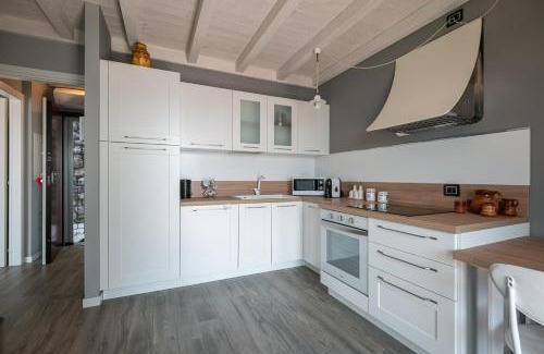 Parzanica Apartment | Panorama: Oceanfront Retreat with Pool & Kid-Friendly Fun