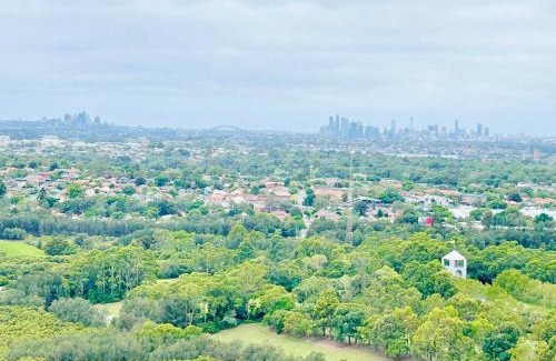 Sydney Olympic Park Apartment | Panoramic City View 3-Bedroom Condo with Wi-Fi & Parking