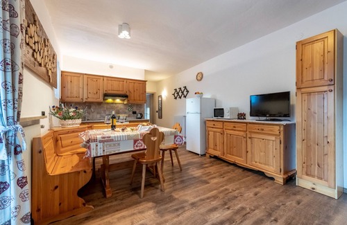 Pera Apartment | Unforgettable Views in Val di Fassa with Family Amenities
