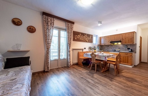 Pera Apartment | Unforgettable Views in Val di Fassa with Family Amenities