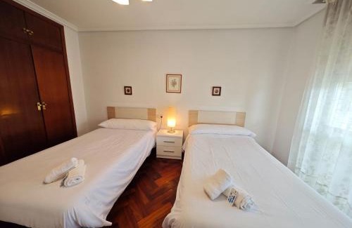 A Porqueira Apartment | Inviting Panxon: Family-Friendly Terrace Retreat Awaits