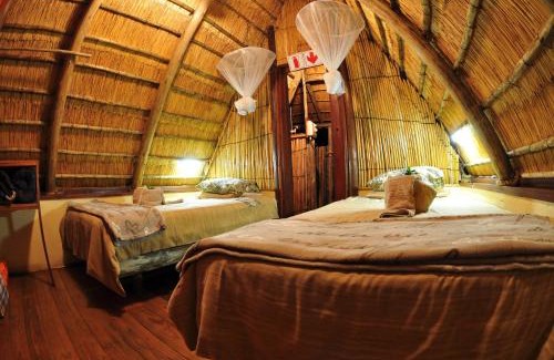 Thorny Bush Game Reserve Resort | Panzi Lodge: Oceanfront Retreat with Pool & Family Amenities