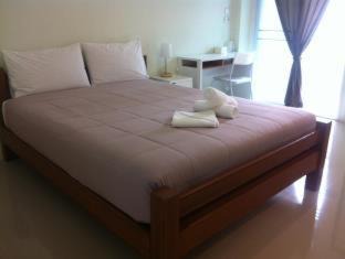 Talat Hotel | Cozy Papangkorn House: Family-Friendly Retreat Awaits