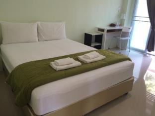 Talat Hotel | Cozy Papangkorn House: Family-Friendly Retreat Awaits