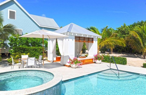 West Bay House | Oceanfront Papaya Cottage: Guest Rated 10/10 with Pool