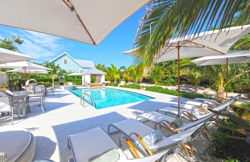 West Bay House | Oceanfront Papaya Cottage: Guest Rated 10/10 with Pool