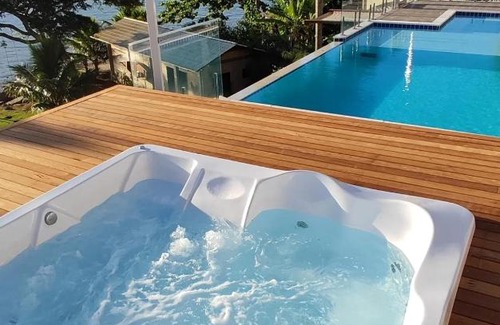 Palhoca Apartment | Beachfront Getaway at Paraíso da Enseada de Brito