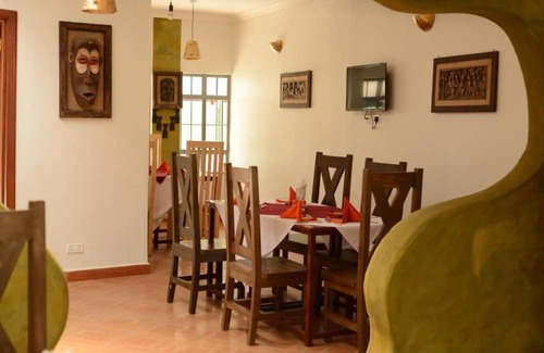 Arusha Bed & Breakfast | Cozy Parachichi House BNB: Pet-Friendly & Family-Oriented