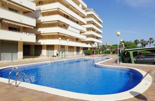 La Pineda Apartment | Paradise Awaits at Paradis Park: Poolside & Oceanfront Living