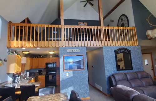 Stover House | Experience Paradise at Proctor Cove with Stunning Lake Views