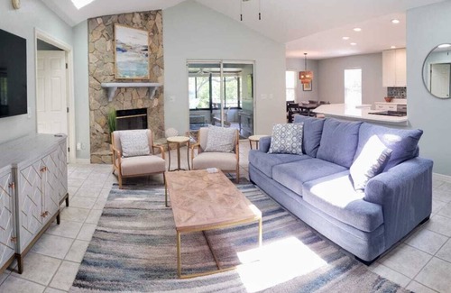 Butler Beach House | Paradise by the River: Pet-Friendly Retreat with Pool & Spa