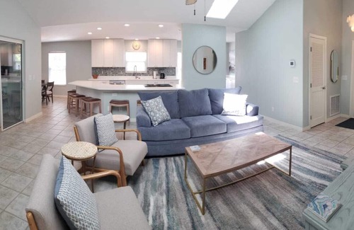 Butler Beach House | Paradise by the River: Pet-Friendly Retreat with Pool & Spa