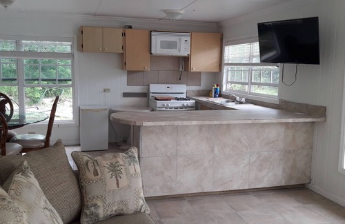 Andros Town Cottage | Cozy Paradise Creek Cottages with Oceanfront Views