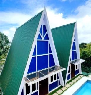 Elappara Cabin | Discover Paradise Meadows with a Relaxing Pool Retreat
