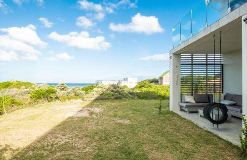Paradise Beach House | Oceanfront Paradise: Pet-Friendly Beach Retreat with Top Ratings