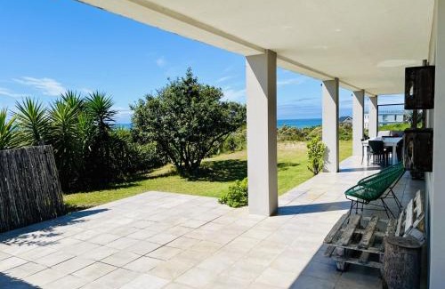 Paradise Beach House | Oceanfront Paradise: Pet-Friendly Beach Retreat with Top Ratings